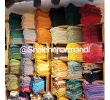 Natural fiber shawl with tassels
